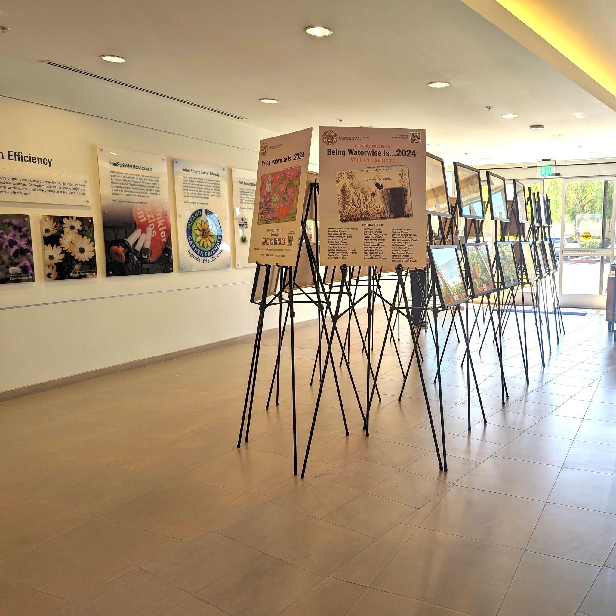 The hallway of the Wester Waters office showing the Art Contest art displayed on easels.